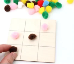 Lot 50 pompons multicolores 15 mm