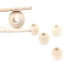 Perle bois naturel de 2 cm trou de 7 mm unité