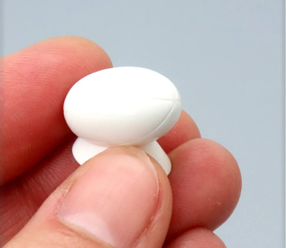 Pion ballon de rugby blanc