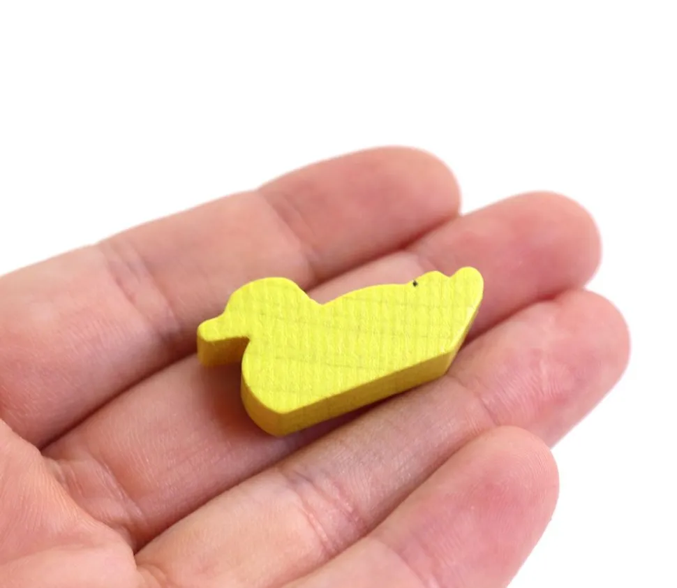 Pion canard jaune en bois pour jeu