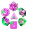 Set 7 dés multi-faces evergreen translucide violet et vert