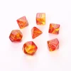 Set 7 dés multi-faces rouge et jaune translucide chiffres dorés