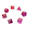 Set 7 dés multi-faces violet et rouge translucide chiffres dorés