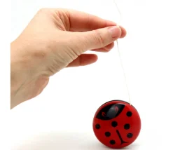 Yoyo coccinelle en bois à l'unité 5,6 cm